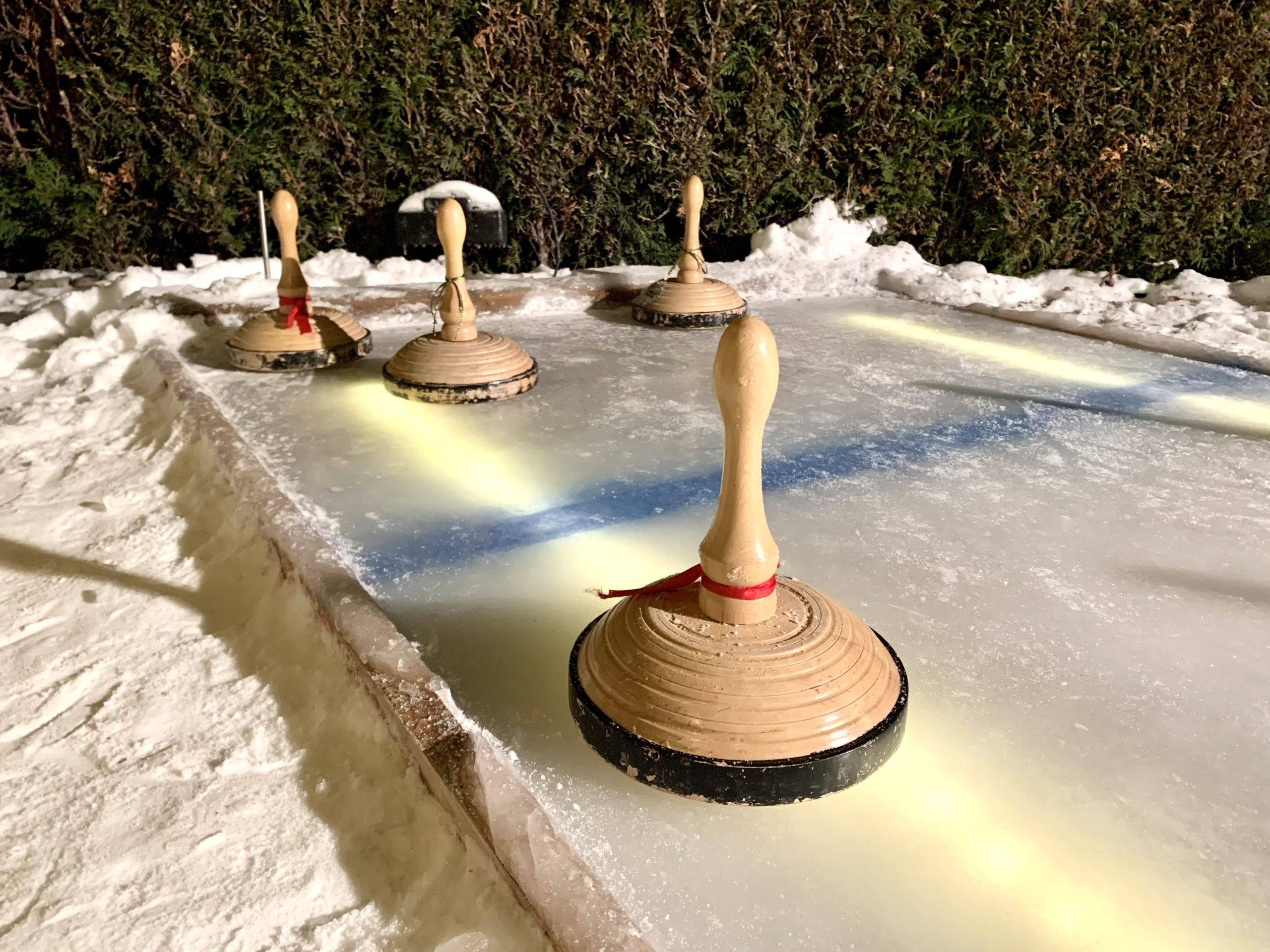 Curling stick on a selfmade rink